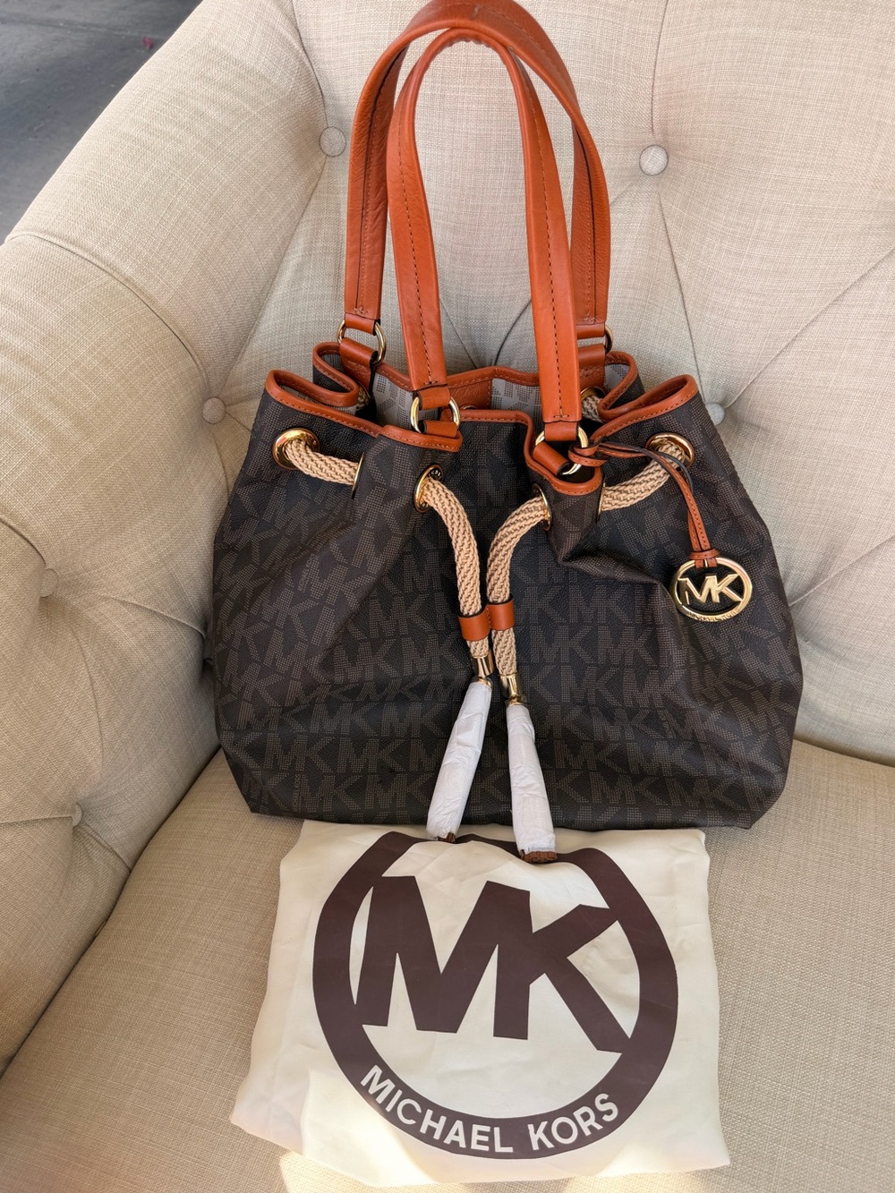 Michael Kors Brown Monogram Tassel Drawstring Shoulder Bag with Dust Bag